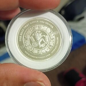 Silver Coin with Mayan Design